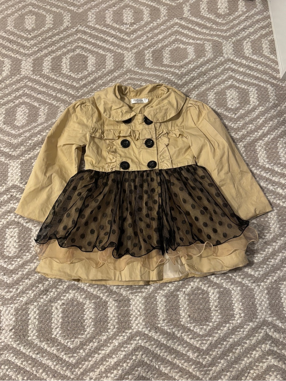 Trench coat style dress with black tulle polka dots